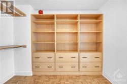 Custom built ins in walk in closet in primary - 