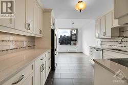 Kitchen with lots of counter space and cabinetry - 