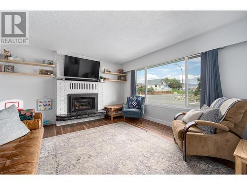 1240 Semlin Drive, Ashcroft, BC - Indoor Photo Showing Living Room With Fireplace