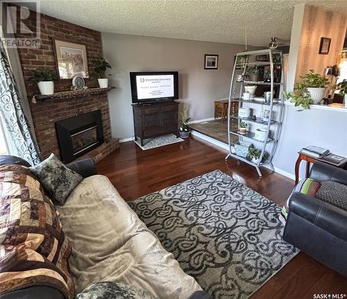 362 35Th Street, Battleford, SK - Indoor Photo Showing Living Room With Fireplace