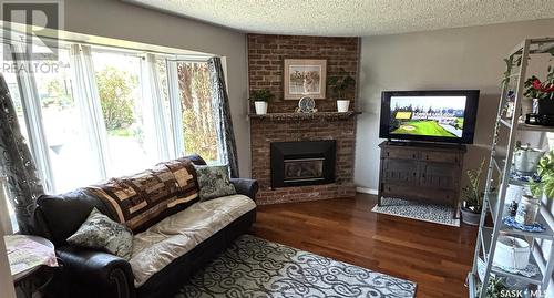 362 35Th Street, Battleford, SK - Indoor Photo Showing Living Room With Fireplace