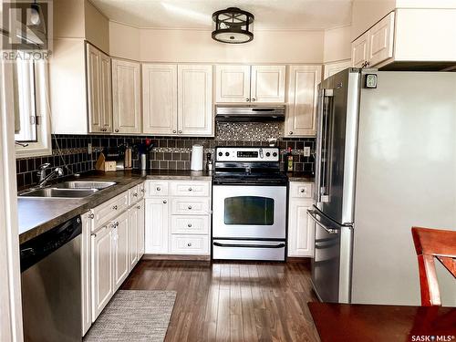 307 6Th Avenue E, Nipawin, SK - Indoor Photo Showing Kitchen With Double Sink