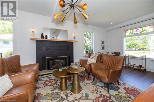 LR/DR - 86 Toronto Street N, Markdale, ON - Indoor Photo Showing Living Room With Fireplace