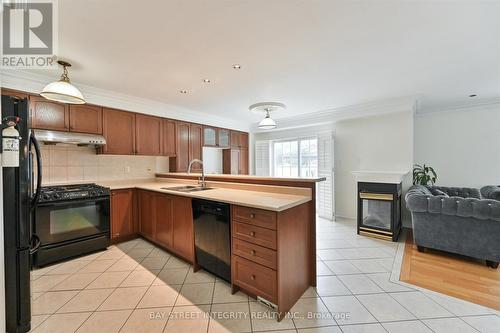 33 Ramsgate Court, Markham, ON - Indoor Photo Showing Kitchen With Fireplace With Double Sink