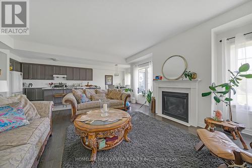 3 John Weddell Avenue, East Gwillimbury, ON - Indoor Photo Showing Living Room With Fireplace