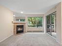 203-1500 Elford St, Victoria, BC  - Indoor Photo Showing Living Room With Fireplace 