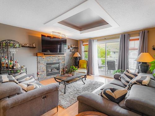 1037 Raven Cres, Kamloops, BC - Indoor Photo Showing Living Room With Fireplace