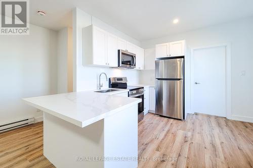 5 - 1052 Barton Street E, Hamilton (Crown Point), ON - Indoor Photo Showing Kitchen With Stainless Steel Kitchen