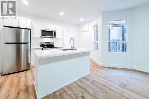 5 - 1052 Barton Street E, Hamilton (Crown Point), ON - Indoor Photo Showing Kitchen With Stainless Steel Kitchen