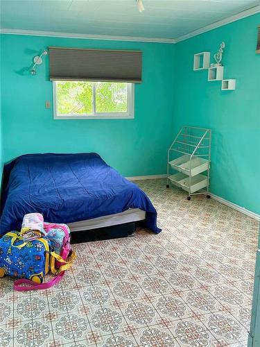 166055 31N Road, Reston, MB - Indoor Photo Showing Bedroom