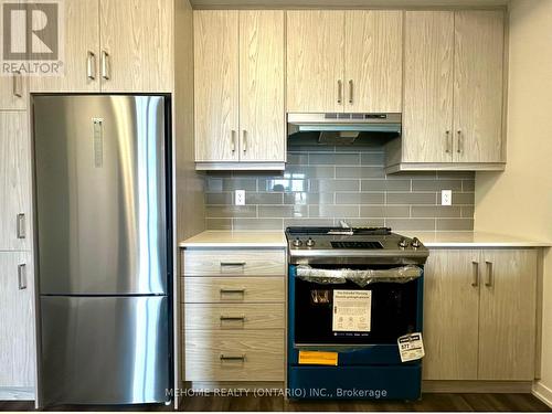 283 - 140 Honeycrisp Crescent, Vaughan, ON - Indoor Photo Showing Kitchen