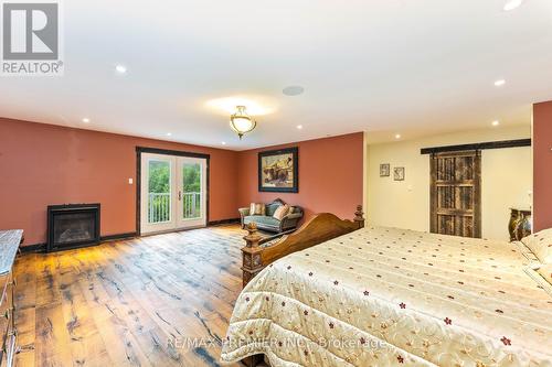 6808 Coolihans Side Road, Caledon, ON - Indoor Photo Showing Bedroom With Fireplace