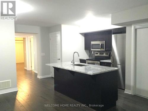 1 - 155 William Duncan Road, Toronto (Downsview-Roding-Cfb), ON - Indoor Photo Showing Kitchen With Upgraded Kitchen