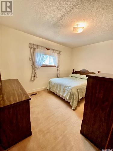 621 Herbert Street, Brownlee, SK - Indoor Photo Showing Bedroom