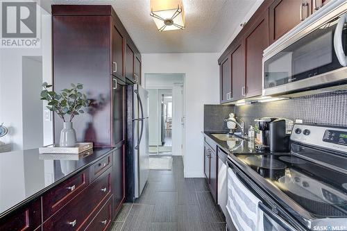 603 320 5Th Avenue N, Saskatoon, SK - Indoor Photo Showing Kitchen With Upgraded Kitchen