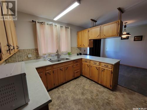 102 Jubilee Bay, Unity, SK - Indoor Photo Showing Kitchen With Double Sink