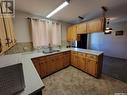 102 Jubilee Bay, Unity, SK  - Indoor Photo Showing Kitchen With Double Sink 