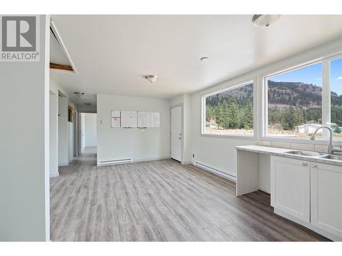 5030 Cousins Road, Peachland, BC - Indoor Photo Showing Kitchen With Double Sink