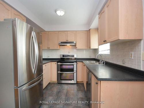 113-5260 Mcfarren Blvd, Mississauga, ON - Indoor Photo Showing Kitchen With Double Sink