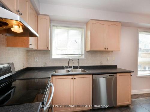 113-5260 Mcfarren Blvd, Mississauga, ON - Indoor Photo Showing Kitchen With Double Sink