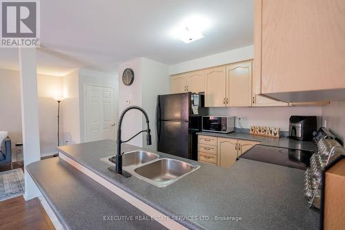 20 Heathwood Drive, Brampton (Fletcher'S Meadow), ON - Indoor Photo Showing Kitchen With Double Sink