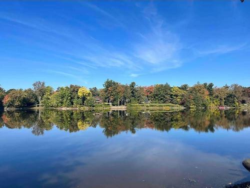 Vue sur l'eau - 15 Rue Alfred, Laval (Sainte-Rose), QC - Outdoor With Body Of Water With View