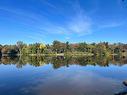 Vue sur l'eau - 15 Rue Alfred, Laval (Sainte-Rose), QC  - Outdoor With Body Of Water With View 