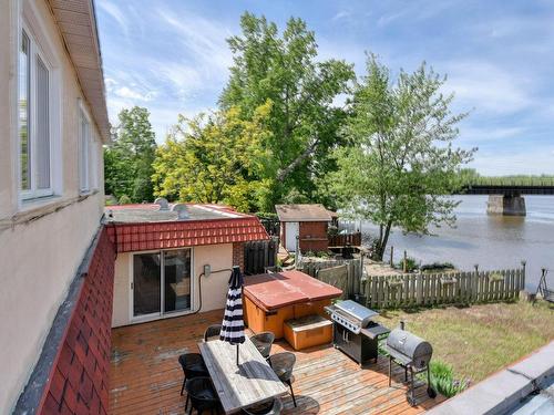 Vue sur l'eau - 15 Rue Alfred, Laval (Sainte-Rose), QC - Outdoor With Deck Patio Veranda With Exterior