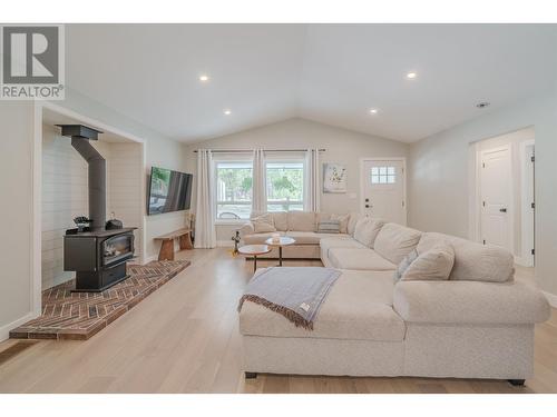 4878 Gloinnzun Drive, 108 Mile Ranch, BC - Indoor Photo Showing Living Room With Fireplace