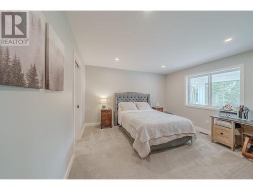 4878 Gloinnzun Drive, 108 Mile Ranch, BC - Indoor Photo Showing Bedroom