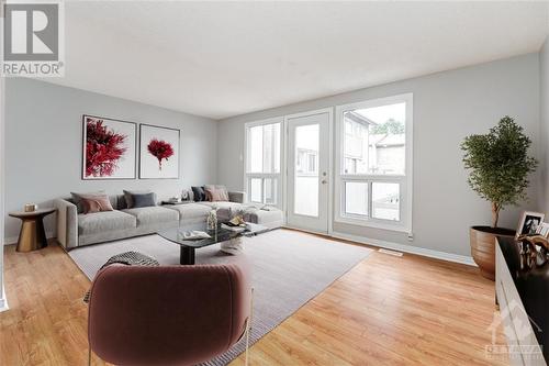 virtually staged. - 1985 Stonehenge Crescent, Ottawa, ON - Indoor Photo Showing Living Room