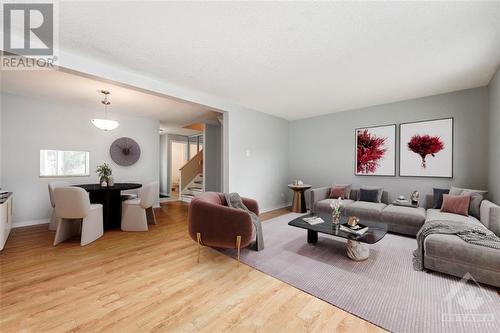 virtually staged. - 1985 Stonehenge Crescent, Ottawa, ON - Indoor Photo Showing Living Room