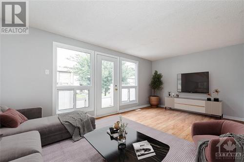 virtually staged. - 1985 Stonehenge Crescent, Ottawa, ON - Indoor Photo Showing Living Room