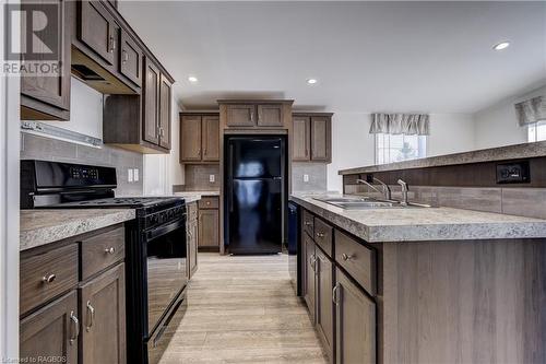 332 6Th Concession Unit# 61, Port Elgin, ON - Indoor Photo Showing Kitchen With Double Sink