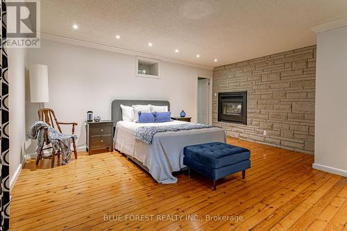 1560 Elgin Road, Thames Centre (Dorchester), ON - Indoor Photo Showing Bedroom With Fireplace