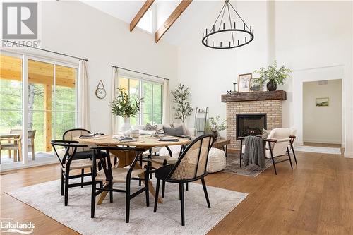 303 Clearwater Lake Road, Huntsville, ON - Indoor Photo Showing Dining Room With Fireplace