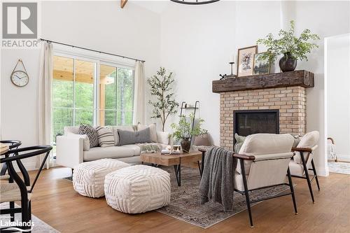 303 Clearwater Lake Road, Huntsville, ON - Indoor Photo Showing Living Room With Fireplace