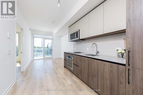 544 - 150 Logan Avenue, Toronto (South Riverdale), ON - Indoor Photo Showing Kitchen