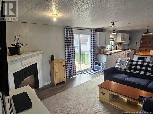 144 Principale, Pointe-Verte, NB - Indoor Photo Showing Living Room With Fireplace