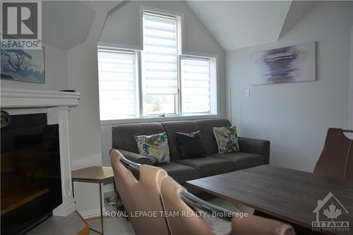 4D - 1036 Barryvale Road, Greater Madawaska, ON - Indoor Photo Showing Living Room With Fireplace