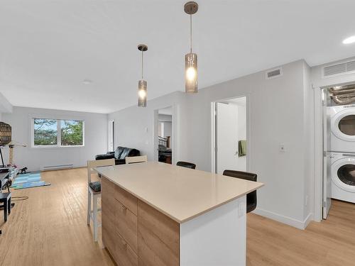 103-4810 Cedar Ridge Pl, Nanaimo, BC - Indoor Photo Showing Laundry Room