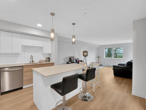 103-4810 Cedar Ridge Pl, Nanaimo, BC - Indoor Photo Showing Kitchen With Upgraded Kitchen