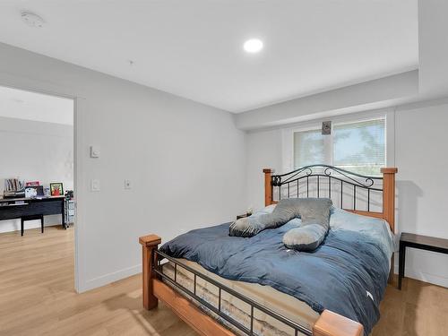 103-4810 Cedar Ridge Pl, Nanaimo, BC - Indoor Photo Showing Bedroom