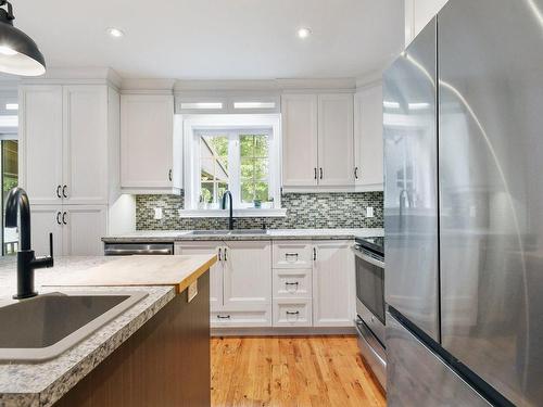 Cuisine - 1333 Ch. Des Anglais, Mascouche, QC - Indoor Photo Showing Kitchen With Upgraded Kitchen