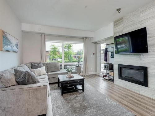 106-2500 Hackett Cres, Central Saanich, BC - Indoor Photo Showing Living Room With Fireplace