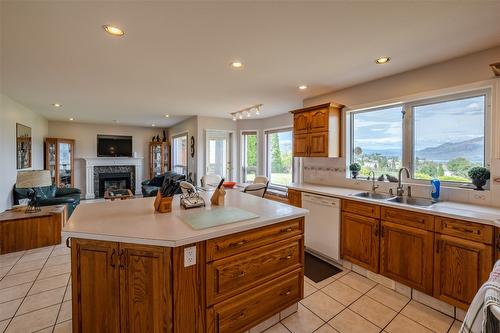 6414 Stevenson Place, Summerland, BC - Indoor Photo Showing Kitchen With Fireplace With Double Sink