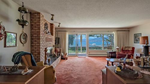 4080 Lakeshore Road, Kelowna, BC - Indoor Photo Showing Living Room With Fireplace