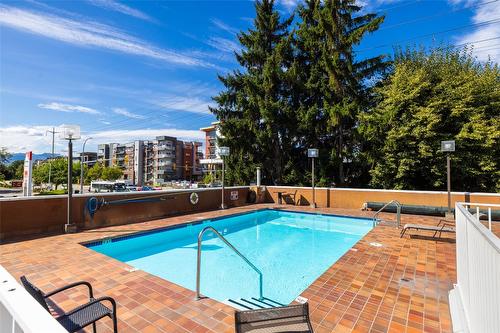 306-737 Leon Avenue, Kelowna, BC - Outdoor With In Ground Pool With Deck Patio Veranda