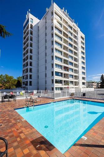 306-737 Leon Avenue, Kelowna, BC - Outdoor With In Ground Pool With Facade