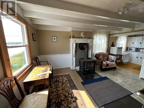 13 Main Road, Champney'S East, NL - Indoor With Fireplace